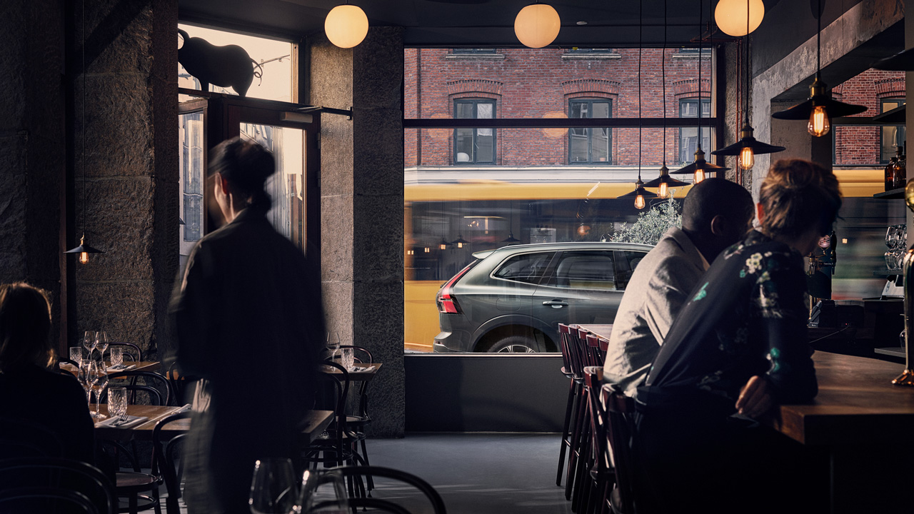 Customers in restaurant with V90 view